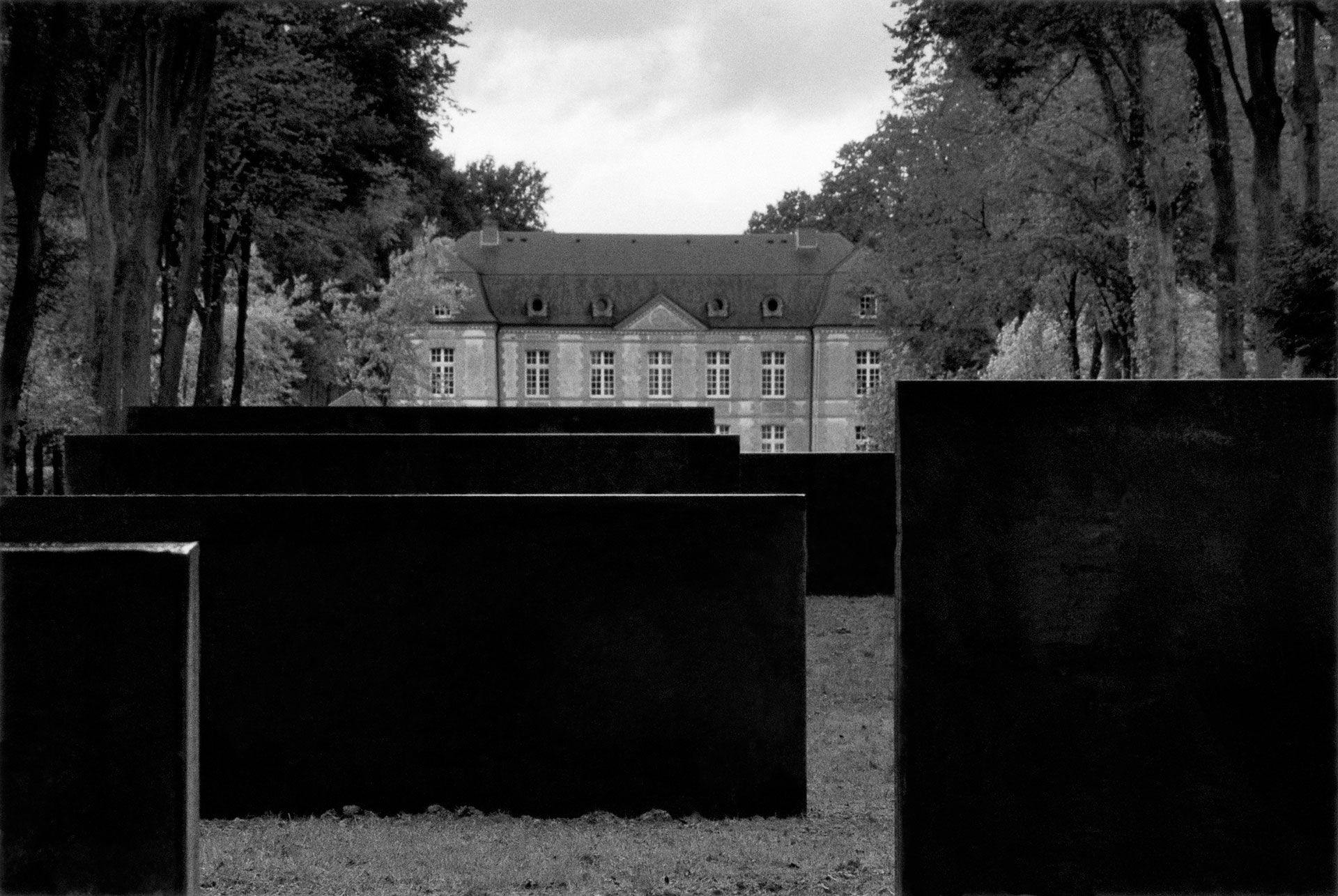 Ten steel slab sculptures by Richard Serra, titled Elevations for L'All√©e de la Mormaire, dated 1993.